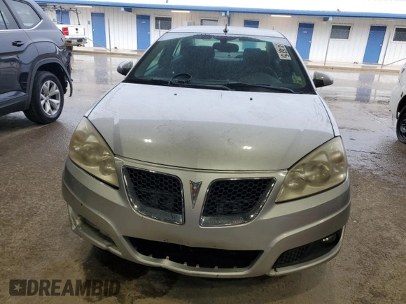 2009 Pontiac G6 GT 1SB z VIN 1G2ZK57K694233980, wystawiony jako Copart lot #54146815 z przebiegiem 96 973 mil mil oraz Szkoda całkowita • Salvage title. Historia ofert i sprzedaży dostępna na DreamBid. Obrazek 5.