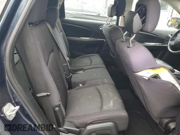 2013 Dodge Journey American Value with VIN 3C4PDCAB6DT577273, listed as a Copart auction lot 50627295 with 139,775 mi miles and Salvage title. Bid and sale history available at DreamBid. Image 12.