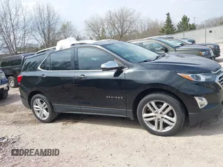 2019 Chevrolet Equinox Premier z VIN 2GNAXYEX5K6143922, wystawiony jako IAAI lot #42134219 z przebiegiem 105 496 mil mil oraz . Historia ofert i sprzedaży dostępna na DreamBid. Obrazek 13.