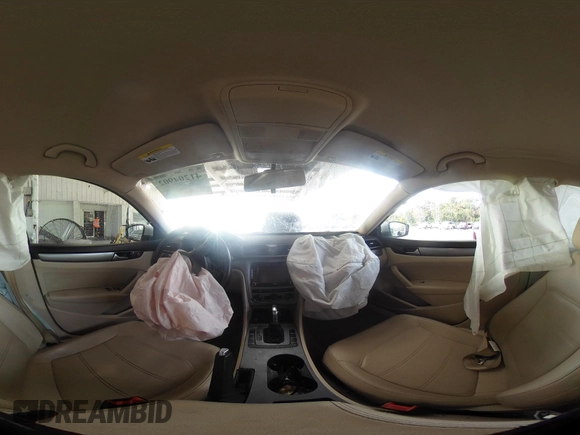 2015 Volkswagen Passat 1.8T Limited Edition with VIN 1VWAT7A3XFC100852, listed as a IAAI auction lot 41204902 with 85,725 mi miles. Bid and sale history available at carsss.com. Image 18.