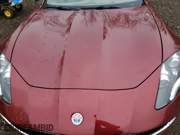 2012 Fisker Karma EcoChic z VIN YH4K16AAXCA001340, wystawiony jako Copart lot #78439634 z przebiegiem 70 515 mil mil oraz Szkoda całkowita • Salvage title. Historia ofert i sprzedaży dostępna na DreamBid. Obrazek 11.