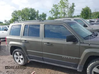 2016 Jeep Patriot Latitude with VIN 1C4NJPFB7GD537598, listed as a IAAI auction lot 42451489 with 131,401 mi miles and . Bid and sale history available at DreamBid. Image 13.