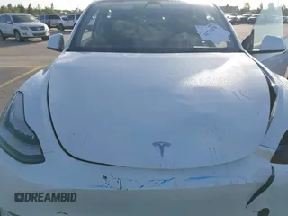 2021 Tesla Model Y Standard Range with VIN 5YJYGDED3MF103650, listed as a IAAI auction lot 41726278 with Not Provided miles and . Bid and sale history available at DreamBid. Image 10.