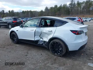 2023 Tesla Model Y Long Range with VIN 7SAYGDEE7PF832007, listed as a IAAI auction lot 41751598 with 14,126 mi miles and . Bid and sale history available at DreamBid. Image 14.