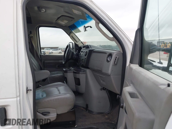 2013 Ford Econoline Cargo Commercial with VIN 1FTNE2EW9DDB02704, listed as a IAAI auction lot 42596289 with 243,629 mi miles and . Bid and sale history available at DreamBid. Image 5.