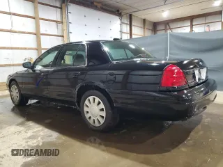 2006 Ford Police Interceptor with VIN 2FAFP71W16X144089, listed as a Copart auction lot 44249135 with 203,859 mi miles and Clean title. Bid and sale history available at DreamBid. Image 2.