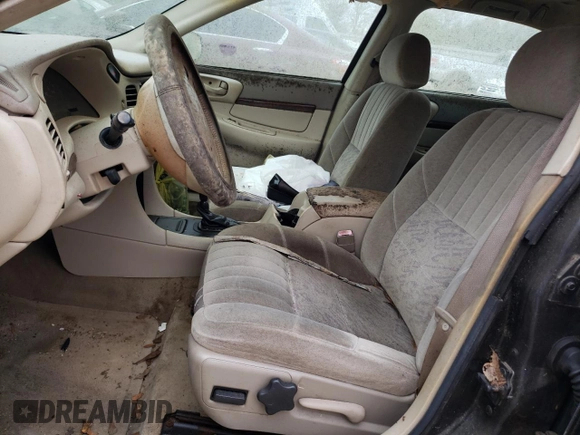 2002 Chevrolet Impala with VIN 2G1WF55E329164323, listed as a Copart auction lot 73790954 with Not provided miles and Clean title. Bid and sale history available at DreamBid. Image 7.