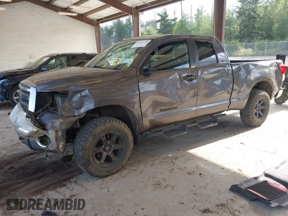 2012 Toyota Tundra with VIN 5TFUY5F13CX259312, listed as a IAAI auction lot 42547918 with 182,190 mi miles and . Bid and sale history available at DreamBid. Image 2.