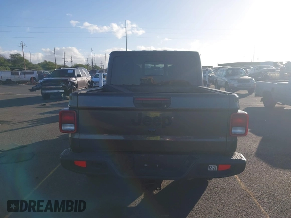 2023 Jeep Gladiator Sport S z VIN 1C6HJTAG4PL507092, wystawiony jako IAAI lot #41221714 z przebiegiem 29 566 mil mil oraz . Historia ofert i sprzedaży dostępna na DreamBid. Obrazek 16.