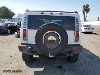 2005 Hummer H2 SUV with VIN 5GRGN23U35H132428, listed as a Copart auction lot 74594554 with 107,701 mi miles and Salvage Title. Bid and sale history available at carsss.com. Image 6.