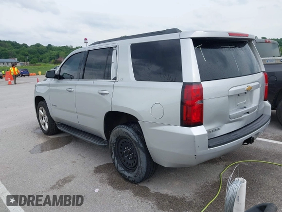 2015 Chevrolet Tahoe LT with VIN 1GNSKBKC3FR224753, listed as a IAAI auction lot 42284497 with 198,943 mi miles and . Bid and sale history available at DreamBid. Image 3.
