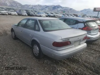 1995 Ford Taurus GL with VIN 1FALP52U5SA320424, listed as a Copart auction lot 83676194 with 177,817 mi miles and Salvage title. Bid and sale history available at DreamBid. Image 2.