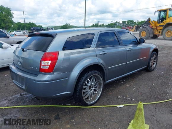 2007 Dodge Magnum z VIN 2D4FV47V17H772794, wystawiony jako IAAI lot #42230019 z przebiegiem 203 676 mil mil oraz . Historia ofert i sprzedaży dostępna na DreamBid. Obrazek 4.