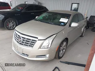 2015 Cadillac XTS Luxury z VIN 2G61M5S39F9246298, wystawiony jako IAAI lot #41555093 z przebiegiem 126 928 mil mil oraz . Historia ofert i sprzedaży dostępna na DreamBid. Obrazek 18.