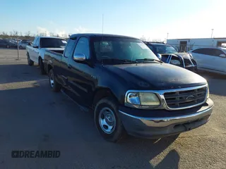 2002 Ford F-150 XL with VIN 2FTRX17282CA94608, listed as a IAAI auction lot 41215380 with 1 mi miles. Bid and sale history available at carsss.com. Image 1.