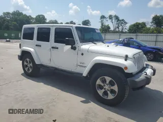 2016 Jeep Wrangler Unlimited Sahara with VIN 1C4BJWEG6GL182794, listed as a Copart auction lot 57880725 with 127,752 mi miles and Salvage title. Bid and sale history available at DreamBid. Image 4.