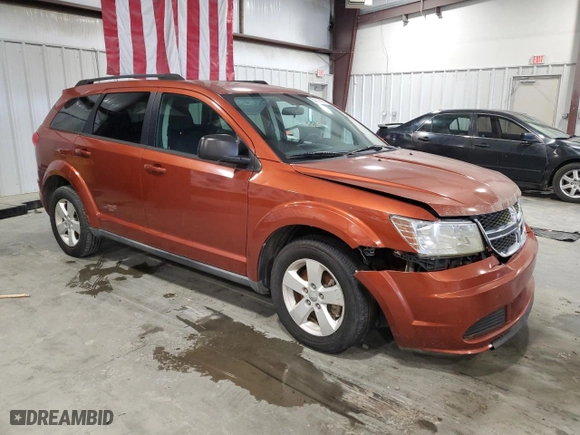 2013 Dodge Journey SE with VIN 3C4PDCABXDT687629, listed as a Copart auction lot 50087495 with 203,848 mi miles and Clean Title. Bid and sale history available at carsss.com. Image 4.