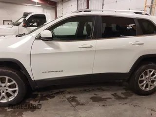 2014 Jeep Cherokee Latitude with VIN 1C4PJMCS4EW318353, listed as a IAAI auction lot 41945598 with 179,425 mi miles and . Bid and sale history available at DreamBid. Image 14.