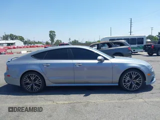 2018 Audi A7 Premium Plus z VIN WAUW3AFC1JN026763, wystawiony jako IAAI lot #42359297 z przebiegiem 108 937 mil mil oraz . Historia ofert i sprzedaży dostępna na DreamBid. Obrazek 14.