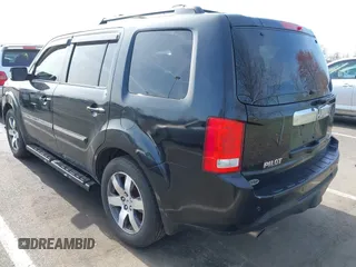 2012 Honda Pilot Touring with VIN 5FNYF4H96CB041380, listed as a IAAI auction lot 41941615 with 137,537 mi miles and . Bid and sale history available at DreamBid. Image 3.