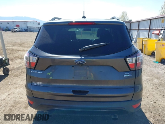 2017 Ford Escape SE with VIN 1FMCU9G94HUE80554, listed as a IAAI auction lot 42039491 with 57,145 mi miles. Bid and sale history available at carsss.com. Image 16.