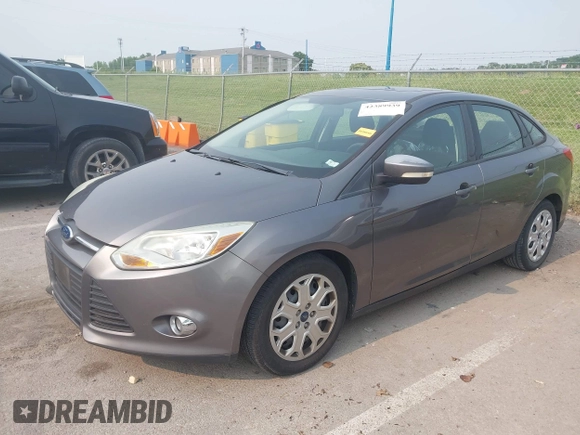 2012 Ford Focus SE z VIN 1FAHP3F24CL227225, wystawiony jako IAAI lot #42389939 z przebiegiem 135 197 mil mil oraz . Historia ofert i sprzedaży dostępna na DreamBid. Obrazek 17.