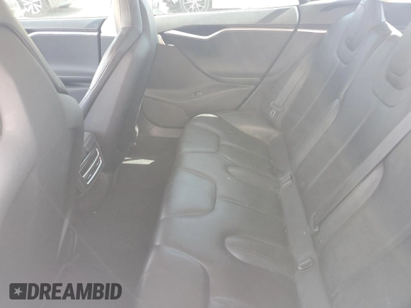 2014 Tesla Model S 60 с VIN 5YJSA1S13EFP29202, выставлен на аукционе Copart как лот 59046255 с пробегом Не указан миль и Списание • Salvage title. История ставок и продаж доступна на DreamBid. Изображение 10.