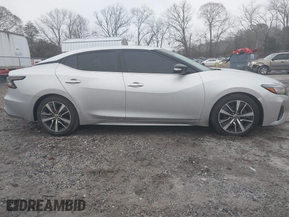 2019 Nissan Maxima Platinum z VIN 1N4AA6AV6KC372254, wystawiony jako IAAI lot #41519515 z przebiegiem 124 326 mil mil oraz . Historia ofert i sprzedaży dostępna na DreamBid. Obrazek 13.