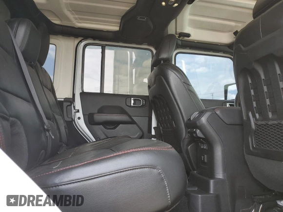 2023 Jeep Wrangler Rubicon with VIN 1C4HJXFG3PW691724, listed as a Copart auction lot 50985745 with 32,377 mi miles and Salvage title. Bid and sale history available at DreamBid. Image 12.
