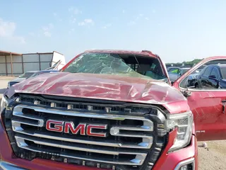 2019 GMC Sierra 1500 SLT z VIN 1GTU9DED2KZ210981, wystawiony jako IAAI lot #42315099 z przebiegiem Nie podano mil oraz . Historia ofert i sprzedaży dostępna na DreamBid. Obrazek 6.