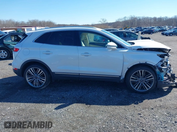 2015 Lincoln MKC with VIN 5LMTJ2AH8FUJ31911, listed as a IAAI auction lot 41735017 with 76,332 mi miles. Bid and sale history available at carsss.com. Image 13.