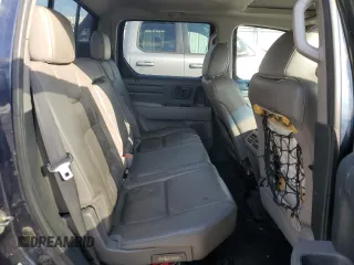 2012 Honda Ridgeline RTL z VIN 5FPYK1F51CB455815, wystawiony jako Copart lot #50969885 z przebiegiem Nie podano mil oraz Szkoda całkowita • Salvage title. Historia ofert i sprzedaży dostępna na DreamBid. Obrazek 10.