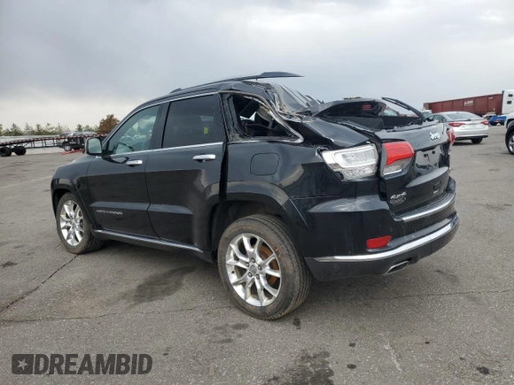 2015 Jeep Grand Cherokee Summit with VIN 1C4RJFJG2FC913658, listed as a Copart auction lot 52160035 with 138,008 mi miles and Salvage Title. Bid and sale history available at DreamBid. Image 2.