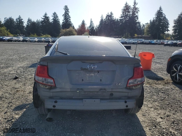 2011 Scion tC with VIN JTKJF5C76B3000765, listed as a Copart auction lot 53954445 with 243,554 mi miles and Salvage Title. Bid and sale history available at carsss.com. Image 6.