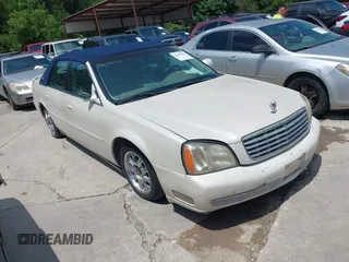 2002 Cadillac DeVille z VIN 1G6KD54Y42U206950, wystawiony jako IAAI lot #42189419 z przebiegiem 98 150 mil mil oraz . Historia ofert i sprzedaży dostępna na DreamBid. Obrazek 1.