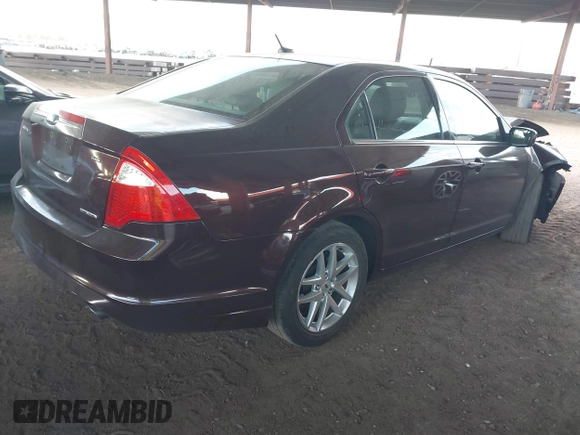 2011 Ford Fusion SEL with VIN 3FAHP0JG7BR324789, listed as a IAAI auction lot 42039962 with 164,726 mi miles. Bid and sale history available at carsss.com. Image 4.
