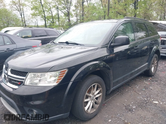 2016 Dodge Journey SXT with VIN 3C4PDCBG2GT100550, listed as a IAAI auction lot 41982670 with 184,601 mi miles. Bid and sale history available at carsss.com. Image 2.