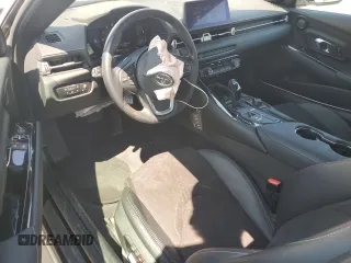 2023 Toyota Supra 3.0 with VIN WZ1DB0G09PW060627, listed as a Copart auction lot 65894025 with 26,657 mi miles and Salvage title. Bid and sale history available at DreamBid. Image 8.