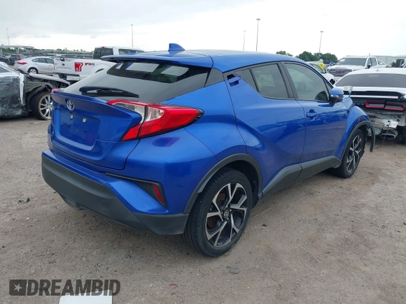 2020 Toyota C-HR LE with VIN JTNKHMBX7L1077218, listed as a IAAI auction lot 41994809 with 69,441 mi miles and . Bid and sale history available at DreamBid. Image 4.