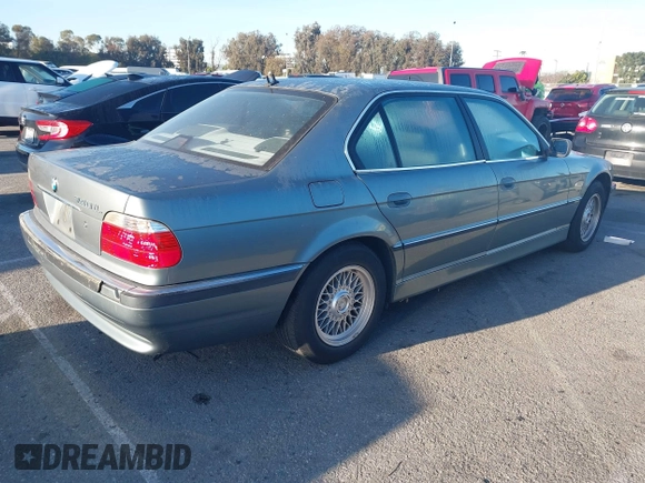 2001 BMW 7 Series 740iL with VIN WBAGH83491DP25818, listed as a IAAI auction lot 41827907 with 125,670 mi miles. Bid and sale history available at carsss.com. Image 4.