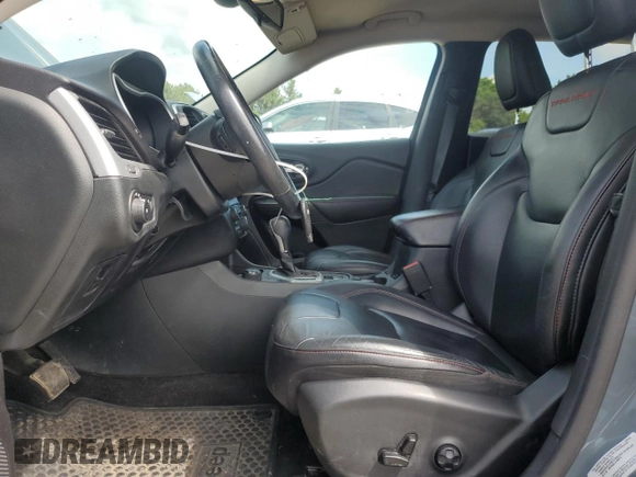 2015 Jeep Cherokee Trailhawk with VIN 1C4PJMBB1FW630715, listed as a Copart auction lot 58559675 with 58,302 mi miles and Salvage title. Bid and sale history available at DreamBid. Image 7.