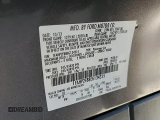 2014 Ford Taurus Limited z VIN 1FAHP2F88EG134315, wystawiony jako Copart lot #48550195 z przebiegiem 136 275 mil mil oraz Szkoda całkowita • Salvage title. Historia ofert i sprzedaży dostępna na DreamBid. Obrazek 14.