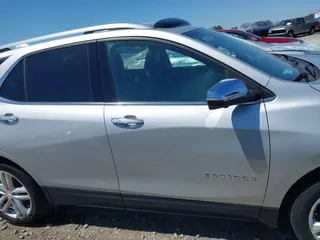 2019 Chevrolet Equinox Premier with VIN 2GNAXPEX7K6251937, listed as a IAAI auction lot 41999362 with 124,207 mi miles and . Bid and sale history available at DreamBid. Image 14.