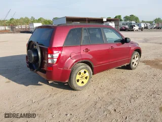2006 Suzuki Grand Vitara Luxury with VIN JS3TD947564104838, listed as a IAAI auction lot 42082783 with 122,912 mi miles. Bid and sale history available at carsss.com. Image 4.