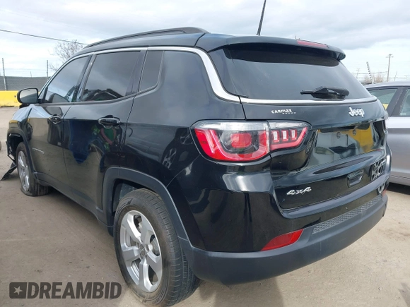 2018 Jeep Compass Altitude with VIN 3C4NJDBB0JT484409, listed as a IAAI auction lot 41656179 with 85,436 mi miles and . Bid and sale history available at carsss.com. Image 3.