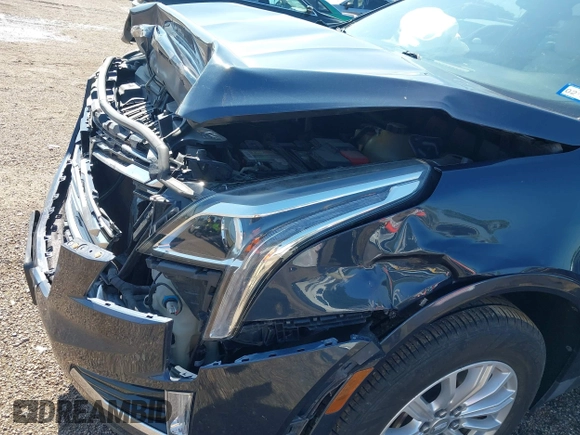 2018 Cadillac XT5 FWD with VIN 1GYKNARS7JZ206816, listed as a IAAI auction lot 42235546 with 94,125 mi miles and . Bid and sale history available at DreamBid. Image 6.