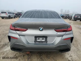 2023 BMW 8 Series M850i with VIN WBAGV8C02PCL20503, listed as a Copart auction lot 84214214 with NaN miles and Salvage Title. Bid and sale history available at carsss.com. Image 6.