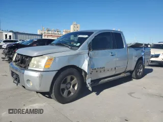 2005 Nissan Titan SE with VIN 1N6AA06AX5N500773, listed as a Copart auction lot 81695634 with 127,210 mi miles and Salvage title. Bid and sale history available at DreamBid. Image 1.