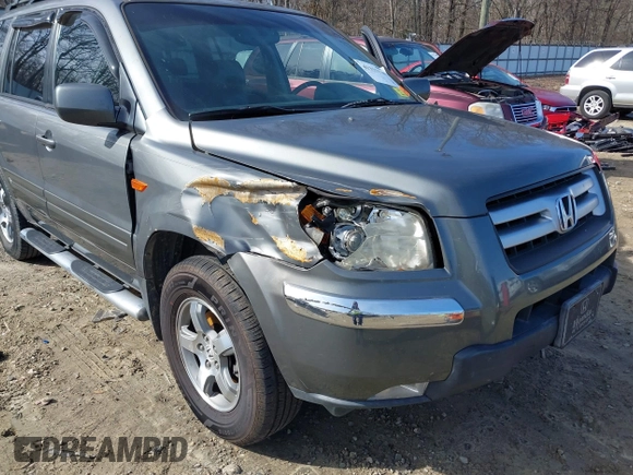 2007 Honda Pilot EX-L with VIN 5FNYF28737B001928, listed as a IAAI auction lot 41311134 with 243,870 mi miles. Bid and sale history available at carsss.com. Image 6.