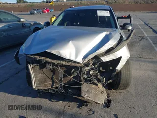 2015 Infiniti Q50 z VIN JN1BV7AP4FM341453, wystawiony jako IAAI lot #41755534 z przebiegiem Nie podano mil oraz . Historia ofert i sprzedaży dostępna na DreamBid. Obrazek 18.